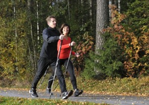 A Swedish person using BungyPump walking poles.